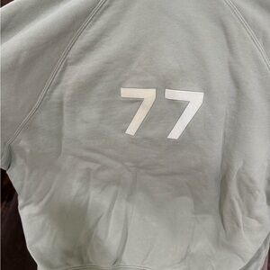 Fear of God Essentials Hoodie in Light Sage Green